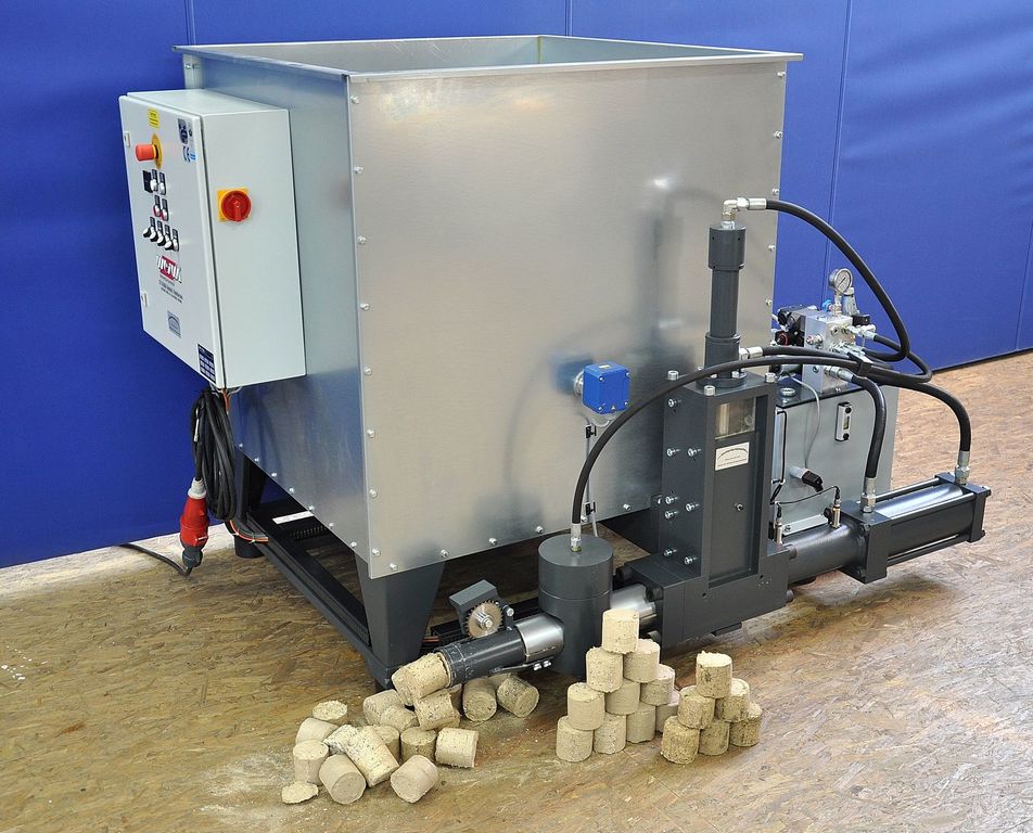 Евродрова брикеты из опилок. Пресс экструдер zbj-6. Станок для производства топливных пеллетов брикетов. Прессовка брикетов. Станок для брикетирования опилок.