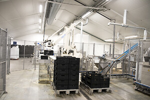 Fuldautomatisk logistiksystem af Sealing System hos Enorm Biofactory